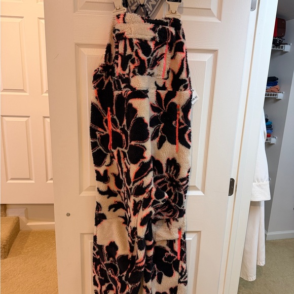 FP Movement by Free People Pants - FP Movement by Free People Hit the Slopes Black and Pink Floral Jumpsuit